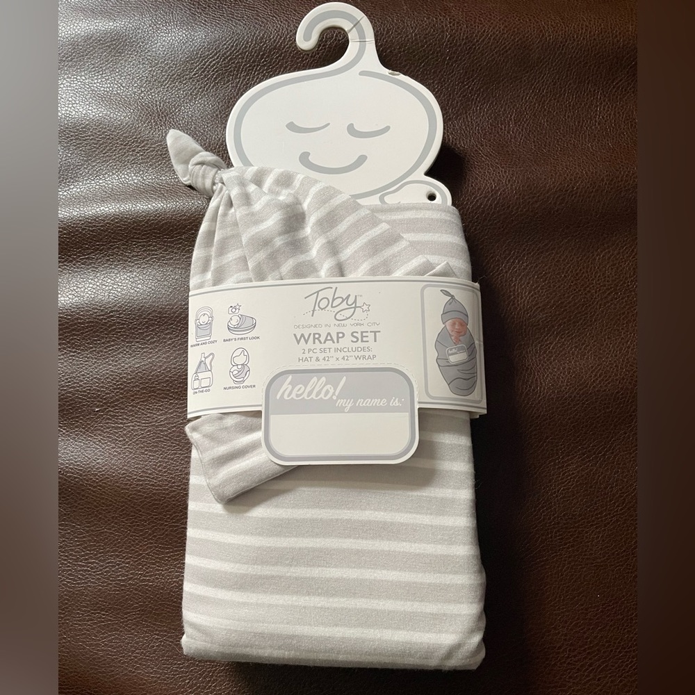 NWOT swaddle and hat set with “hello my name is” tag